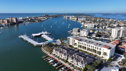 Obraz premium Clearwater Skyline In Clearwater Florida United States. Aerial View Of Stunning Beach With Crystal Clear Waters. Metropole Landscape Company Building Vibrant. Metropole Corporate Town.