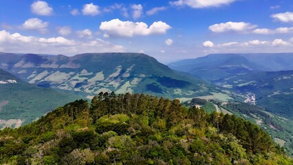 Naklejka premium Stunning Forest In Itati Rio Grande Do Sul Brazil. Stunning Countryside Life Landscape Viewed From Above. Countryside Sky Clouds Rural Field. Countryside Sky Panoramic. Itati Rio Grande do Sul.