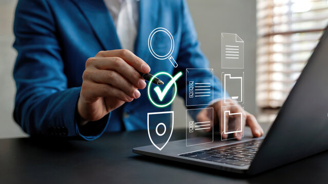 Professional using laptop with security verification, data analysis, and digital documents workflow