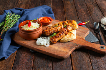 Savory Kebabs Served With Rice and Flavorful Sides