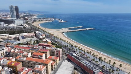 Fototapeta premium Barceloneta Beach In Barcelona Catalonia Spain. Stunning Tropical Coastline Beach Scene Viewed From Above. Paradise Skyline Grateful Vibrant. Paradise Sea. Barcelona Catalonia.