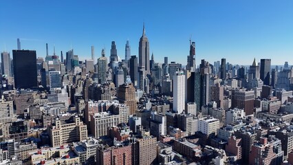 Obraz premium New York Skyline In Manhattan New York United States. Aerial View Of A High-Rise Buildings And Traffic Showcasing Urban Life. Business Sky Downtown Cityscape. Business Panning Wide.