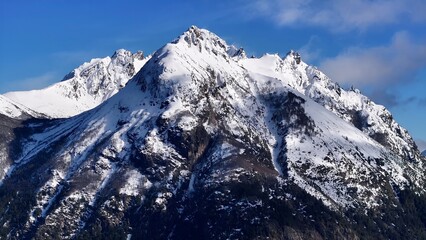 Obraz premium Summit Time Lapse In San Carlos De Bariloche Rio Negro Argentina. Breathtaking Aerial View Of Time Lapse Drone Footage. Outdoor Travel Destinations Patagonia Glacier. Snow Covered High Angle View.