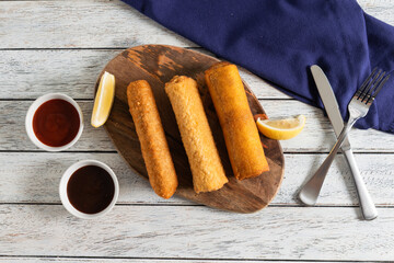 Delicious Fried Rolls Served With Dipping Sauces
