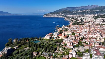 Naklejka premium Sorrento Skyline In Naples Campania Italy. Bustling Downtown Cityscape With Modern Buildings. Shore Clouds Sky Beach Sea. Seaside Panorama. Naples Campania.
