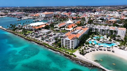 Obraz premium Scenic Island In Oranjestad Caribbean Netherlands Aruba. Bird Eye View Of A Amazing Coastal Beach In The Summer Holiday. Metropolitan Landscape Commercial Building Amazing.
