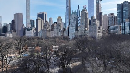 Fototapeta premium Central Park In Manhattan New York United States. Bird Eye View Of Stunning Iconic Recreational Park Of The City. Metropole Landscape Company Building Vibrant. Metropole Corporate Town.