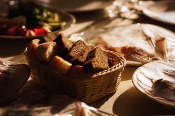 sliced white and black bread in a basket