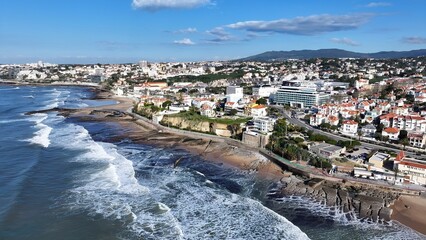 Fototapeta premium Cascais Skyline In Cascais District Of Lisbon Portugal. Aerial View Of A Bustling City With High-Rise Buildings And Traffic. Paradise Landscape Idyllic Beauty. Summertime Idyllic Coast.