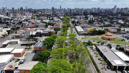 Curitiba Skyline In Curitiba Parana Brazil. Amazing Skysrapers And Traffic On Street Viewed From Above. Business Sky Clouds Downtown Cityscape. Outdoor Downtown Panning Wide. Curitiba Parana.