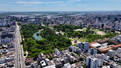 Leisure Park In Porto Alegre Rio Grande Do Sul Brazil. Drone Captures A Garden With Sidewalks Surrounded By Lush Trees. Business Sky Downtown Cityscape. Business Panning Wide.