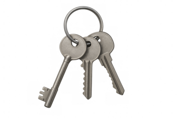 Three metal keys hanging from a metal ring on transparent background