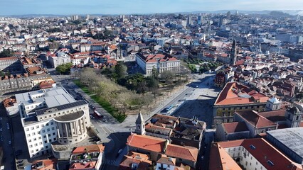 Porto Skyline In Porto Portugal. Aerial View Of A High-Rise Buildings And Traffic Showcasing Urban...