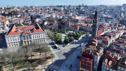 Fototapeta premium Clerigos Church In Porto Portugal. Bird Eye View Of Church Standing Tall Amidst Beautiful Scenery. Business Sky Clouds Downtown Cityscape. Outdoor Downtown Panning Wide. Porto Portugal.