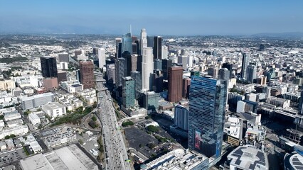 Fototapeta premium Corporate Buildings In Los Angeles California United States. Bustling Downtown Cityscape With Modern Buildings. Business Clouds Sky Downtown Cityscape. Backgrounds Panoramic. Los Angeles California.