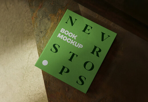 Laying Coated Book Mockup