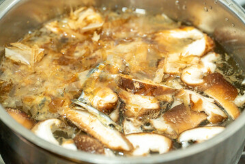 Japanese Dashi Stock with Mushrooms Boiling