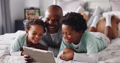 Black family, dad and tablet with children in bed for entertainment or online subscription in home. Happy father, kids or siblings laughing with technology for movie, funny show or humor in bedroom - Powered by Adobe