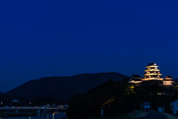 Illuminated Night View of Historic Ozu Castle in Ehime, Japan

