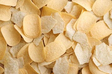 Homemade Flavored Paprika Potato Chips in a Bowl, top view. Flat lay
