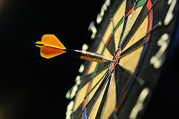 Dart strikes bullseye on a dartboard during a game Generative AI