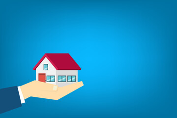 Hand holding house	