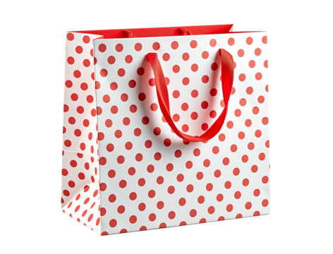 White gift bag with red polka dots and red ribbon handles isolated on a transparent background image