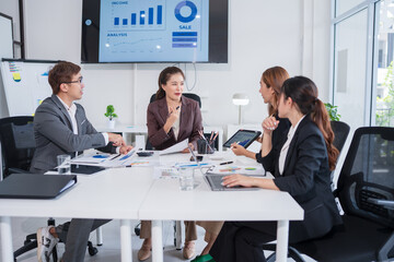 Group of Asian businesspeople are having a meeting.