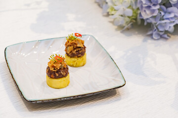 a small set of cocktail appetizer dish before dinner reception