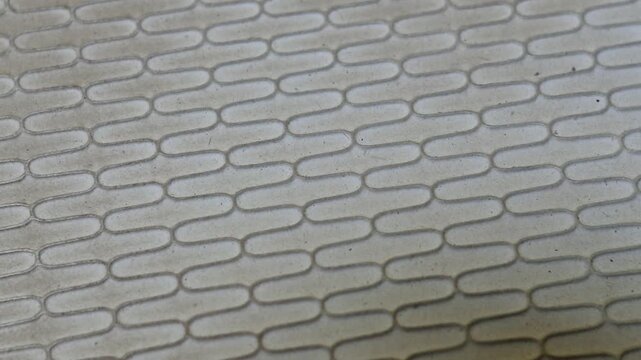 close-up photo of the rubber surface texture of the flip-flops