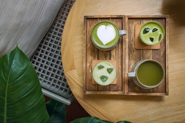four type of matcha menu serving on wooden plate at cafe