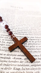 Wooden Rosary Cross on Turkish Written Christian Bible