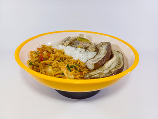Meal consisting of white rice, a stir-fried dish, and sliced eggplant, served in a bright yellow and white bowl on a white background. Related to home cooking, Asian cuisine, balanced meals, meal prep