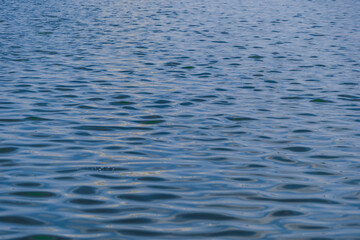 Naklejka premium deep blue sea surface with wave by the heavy wind with many white bubble