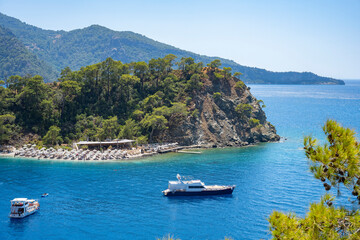 Fototapeta premium Blue Lagoon and Oludeniz beach aerial panoramic view. Oludeniz is a beach resort in the Fethiye district of Mugla Province, Turkey.