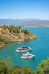 Obraz premium Blue Lagoon and Oludeniz beach aerial panoramic view. Oludeniz is a beach resort in the Fethiye district of Mugla Province, Turkey.