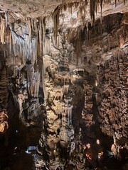 Stalactites and stalagmites creating stunning formations in a cave