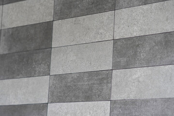 Modern concrete tile pattern creates a sleek, contemporary backdrop for design projects.