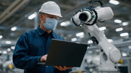 A technician meticulously aligns sensors on a robotic arm, preparing to upload advanced motion algorithms in a high-tech factory where robots assemble precision electronics. - Powered by Adobe
