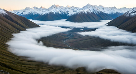 Mountain valley covered in clouds