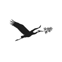 Obraz premium Silhouette of a crane in flight carrying an olive branch, isolated on white background, symbolizing peace, hope, and freedom in a serene natural scene