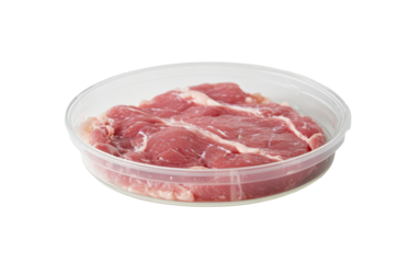 Artificial lab grown meat in petri dish on white background.png