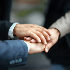three hands shaking or stacked symbolize strategic partnership, representing trust, mutual commitment, and strong collaboration toward shared goals and success.