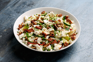 Crunchy Celery, Apple, Cucumber and Feta Cheese Salad. Healthy food.