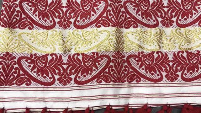 Bihu gamosa of Assam close up or zoom out shot with floral design 