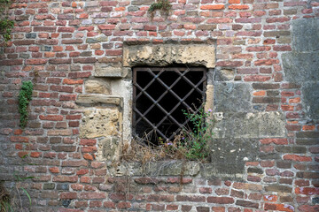 old brick wall with window