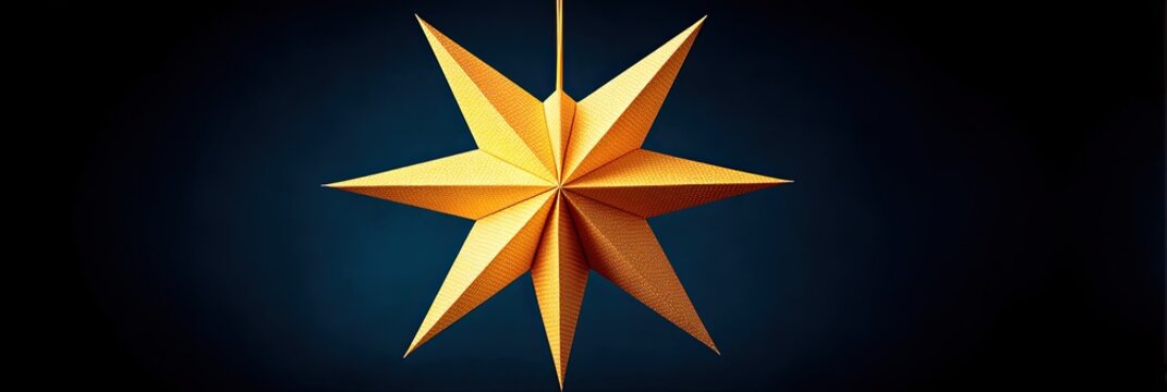 Gold paper star ornament against a dark background - Powered by Adobe