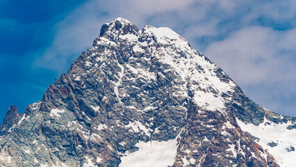 Alpine summer view with Mount Grossglockner in the background at Kalser Glocknerstrasse road, Kals, Lienz, Tyrol, Austria