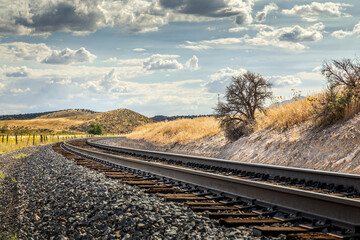Railroad track leading though the amazing landscape of Utah