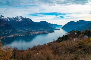 Scenic Lake with Snow-Capped Mountains in the Background